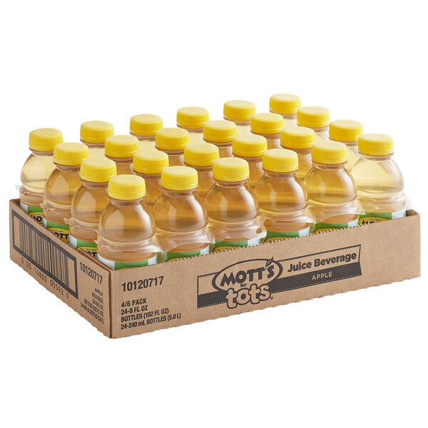 A white box of Mott's For Tots apple juice bottles with yellow caps.