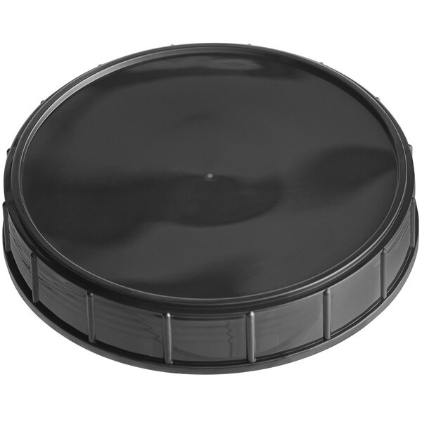 A black plastic lid for a 120 mm canister.