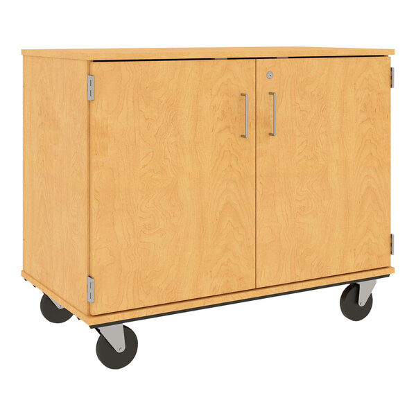 A maple wooden cabinet on wheels with (18) 3" bins inside.