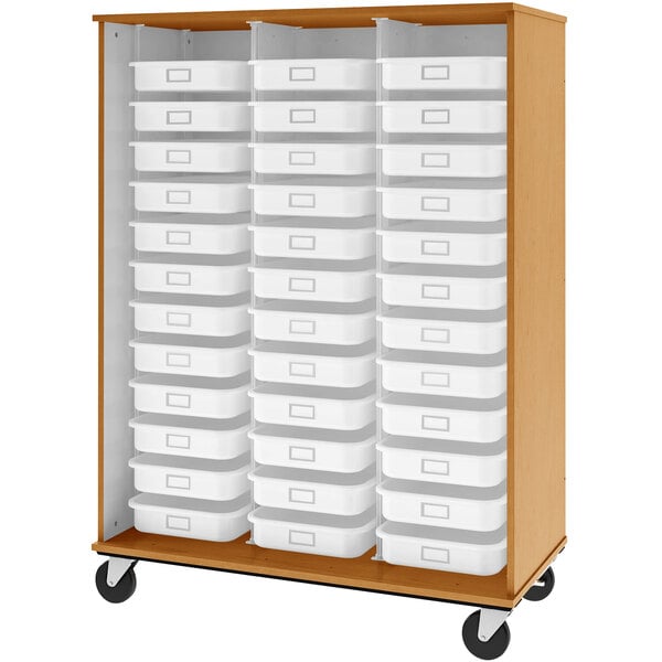 A tall wooden storage cabinet with white plastic bins on shelves.
