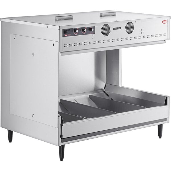 a silver oven with a drawer