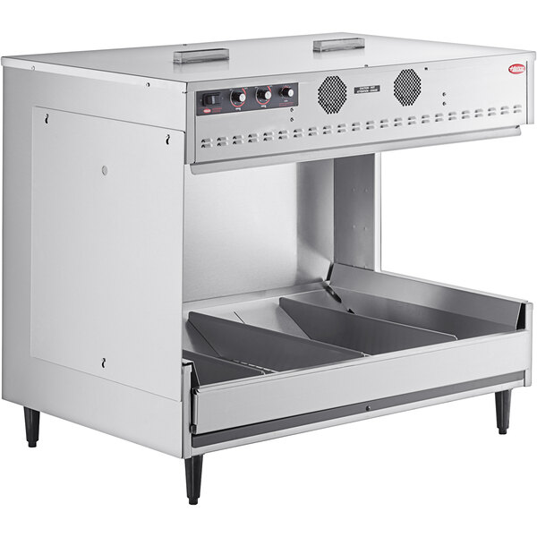 A silver metal Hatco freestanding multi-product warming station with drawers.