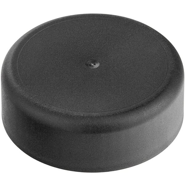 A 38/400 black plastic cap with a foam liner.