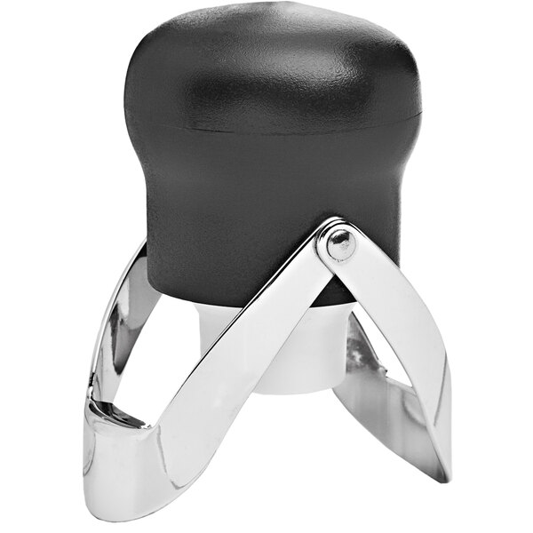 A black and silver Franmara champagne stopper with metal rings on a counter.