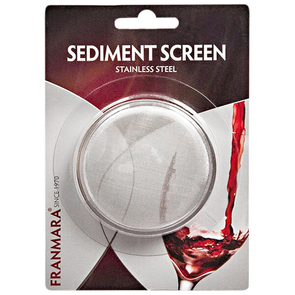 A Decantus stainless steel sediment screen over a wine bottle.