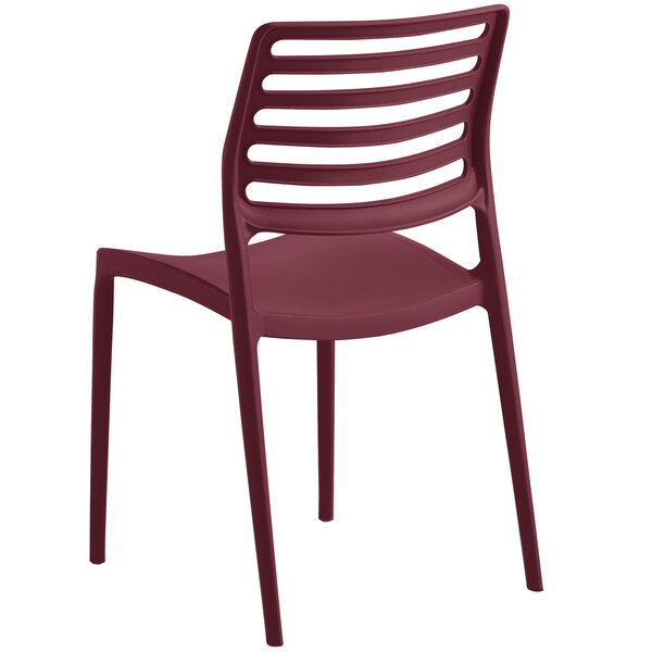 A red plastic Lancaster Table & Seating Allegro Sangria side chair with slats.