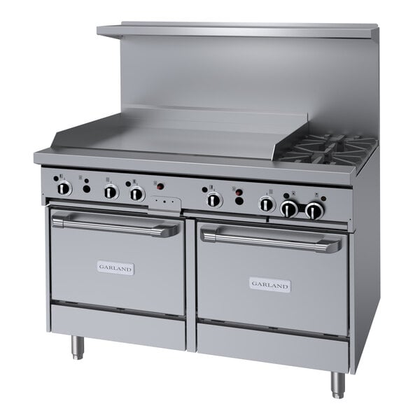 A stainless steel Garland commercial gas range with two burners.