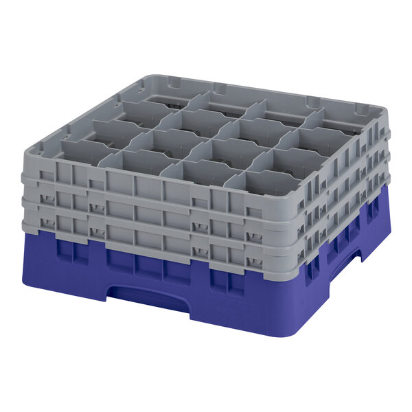 A navy blue and gray 16-compartment glass rack with three extenders designed for washing and transporting glassware.