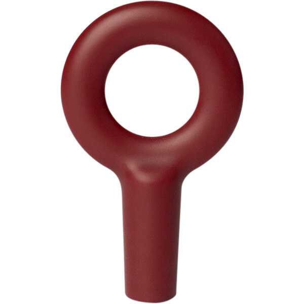 A red plastic ring with a white circle inside of it.