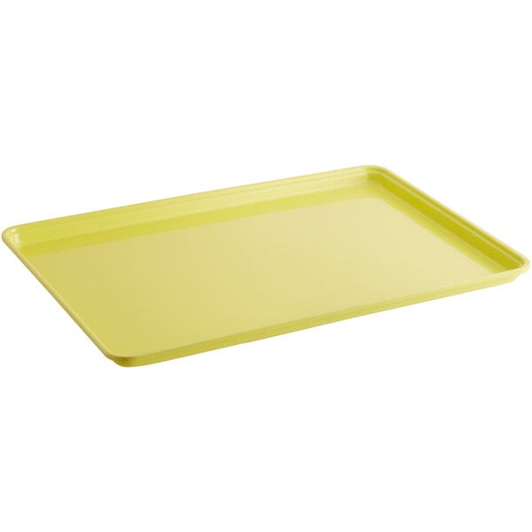 A yellow rectangular MFG Tray with a plastic handle.
