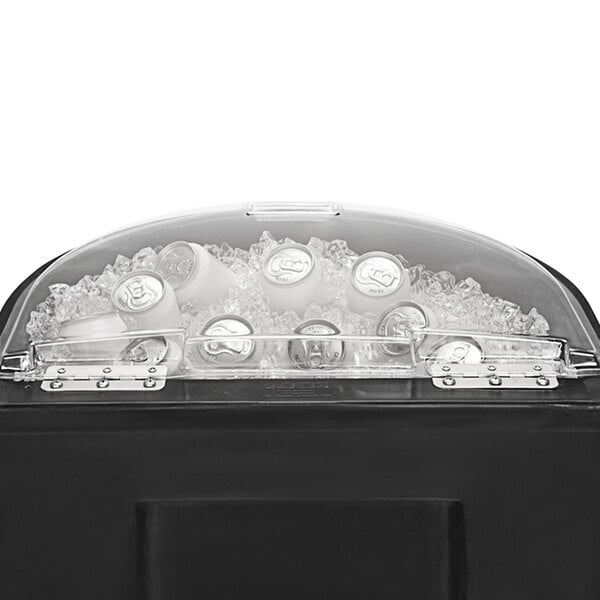 A black IRP Iceberg beverage cooler with a lid full of cans and ice.