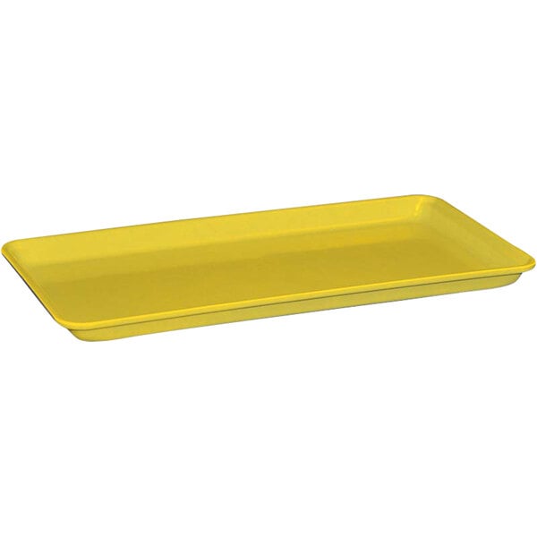 A yellow rectangular fiberglass MFG Tray on a counter.