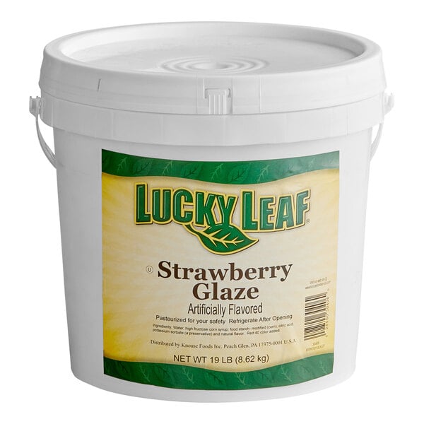 A large white plastic pail with a handle and a label that reads 'Lucky Leaf Strawberry Glaze, Artificially Flavored, Net Wt 19 lb (8.62 kg)'.