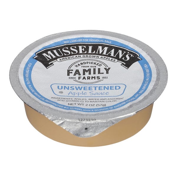 A round container of Musselman's unsweetened applesauce with a blue and white label.