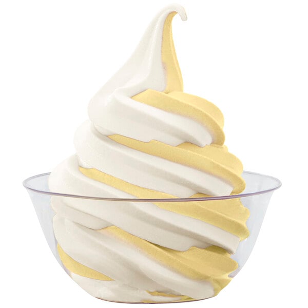 A bowl of white and yellow soft serve ice cream.