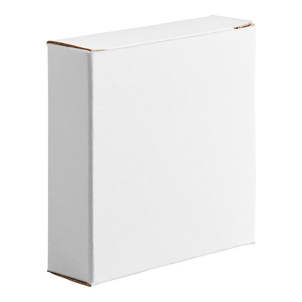 A plain white reverse tuck carton box measuring 3 5/8 inches by 1 inch by 3 5/8 inches.