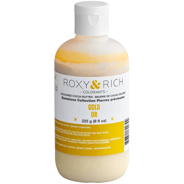 A bottle of Roxy & Rich Gold Cocoa Butter with a label.