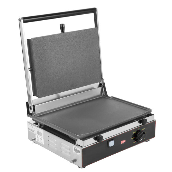 A Cecilware single panini sandwich grill with flat surfaces on a table.