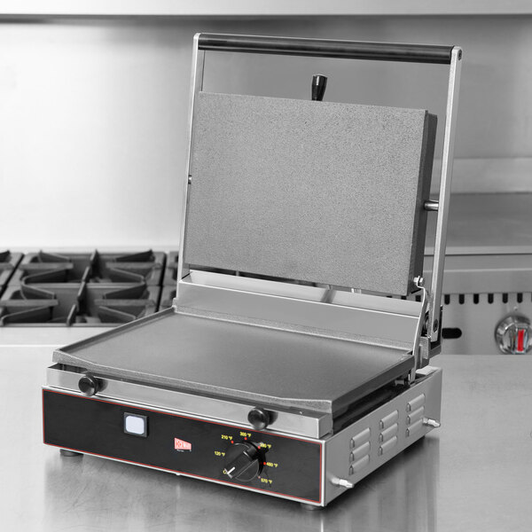 A Cecilware Panini Sandwich Grill with a flat griddle surface on a counter.