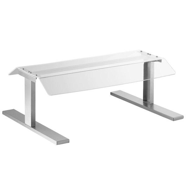 A clear glass and metal rectangular stand with silver legs.
