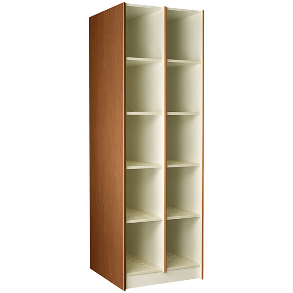 A tall wooden I.D. Systems storage cabinet with shelves and doors.