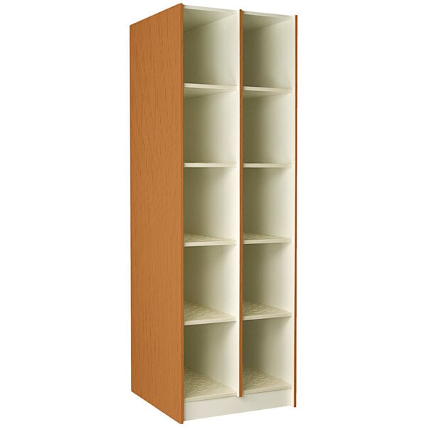 A tall wooden cabinet with shelves with compartments.