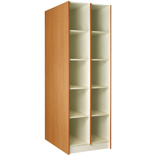 A tall wooden I.D. Systems maple instrument storage cabinet with shelves.