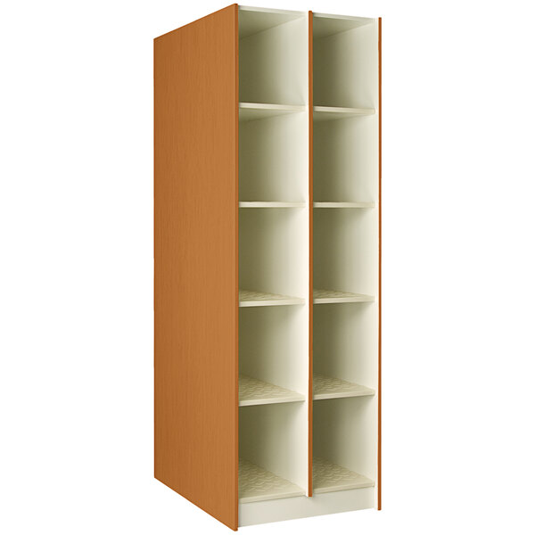 A brown and white I.D. Systems instrument storage cabinet with shelves.