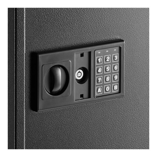 A black steel wall-mounted key cabinet safe with an electronic keypad lock and a manual key override.