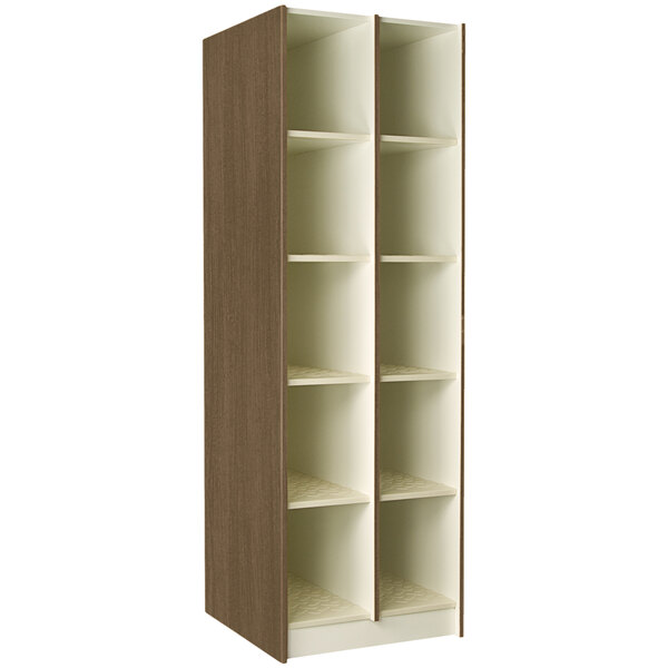 A tall brown I.D. Systems instrument storage cabinet with 10 compartments.