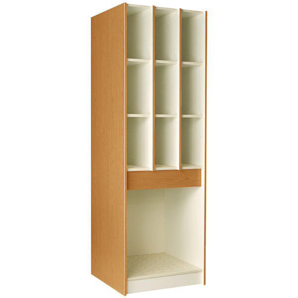 A tall wooden I.D. Systems instrument storage cabinet with shelves and doors.