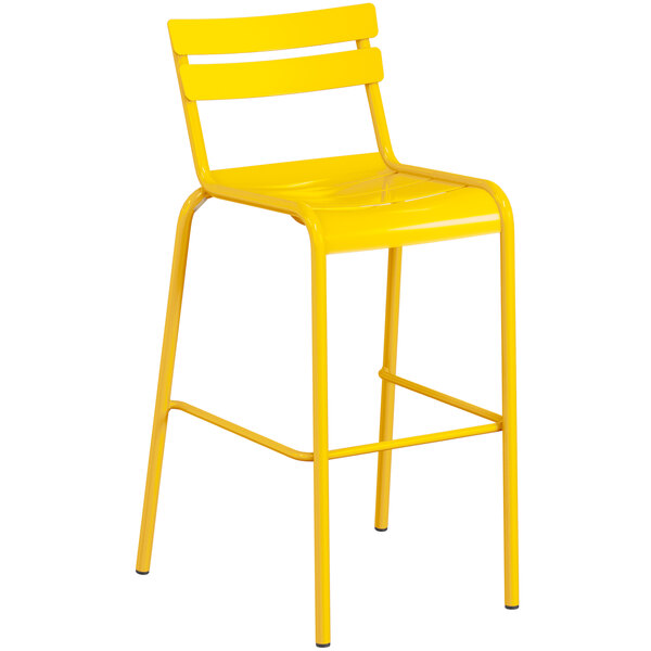 A yellow powder coated aluminum barstool with a white background.