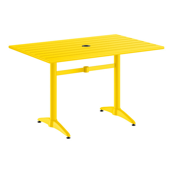 A rectangular yellow powder-coated aluminum outdoor dining table with an umbrella hole in the center.