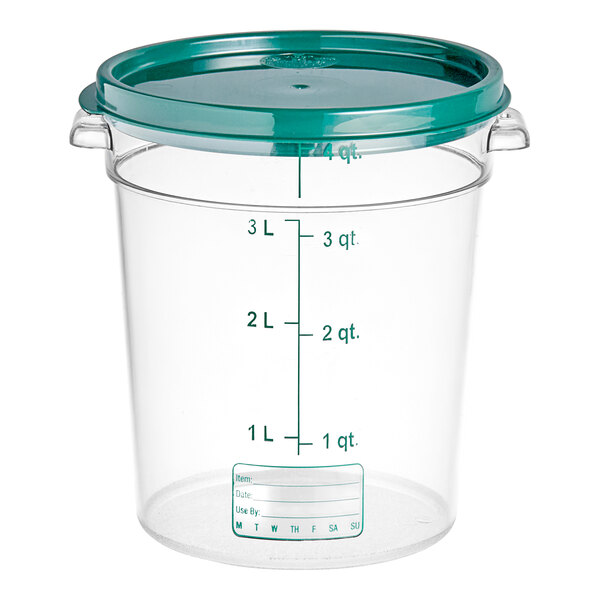 A clear plastic Vigor food storage container with a green lid.