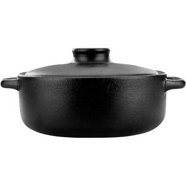 An International Tableware black stoneware casserole dish with a lid.