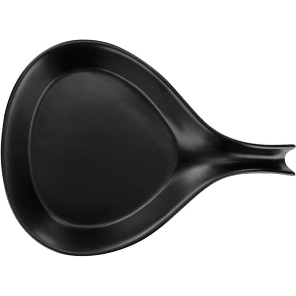a black spoon shaped like a triangle