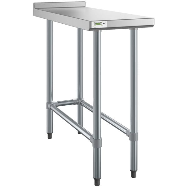 A Regency stainless steel filler table with a backsplash and legs.