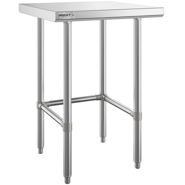 A silver rectangular Regency stainless steel work table with metal legs.