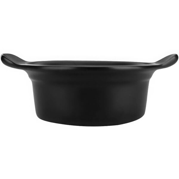 A black stoneware casserole dish with handles.