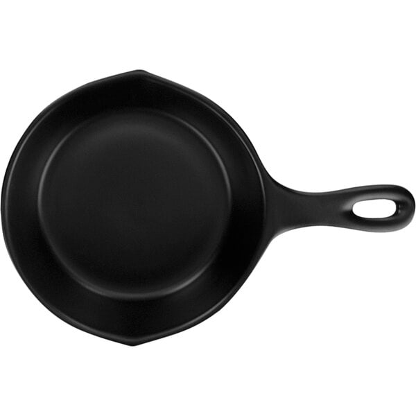 An International Tableware black stoneware serving skillet with a handle.