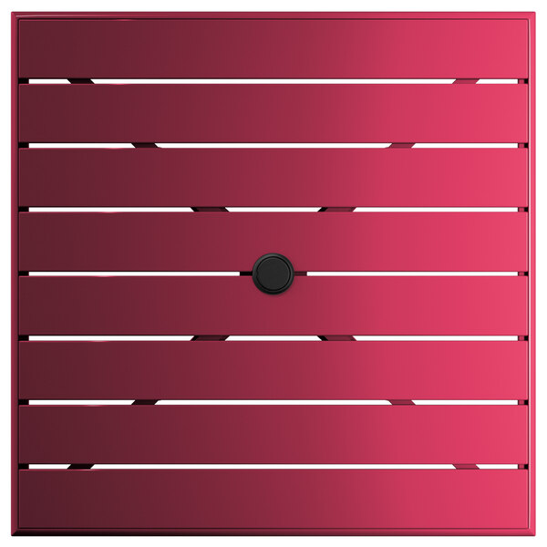 A red square Lancaster Table & Seating outdoor table with a black circle.