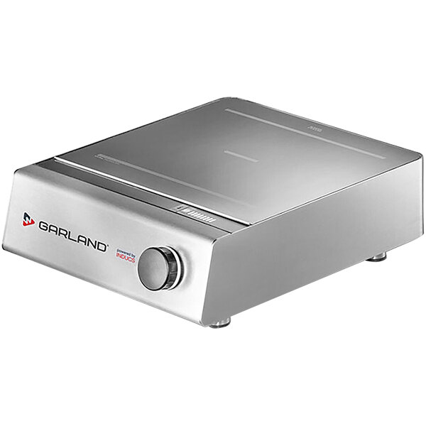 A silver rectangular Garland Instinct countertop induction range with a knob.
