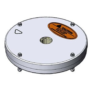 A circular stainless steel plate with an oval orange and black label.