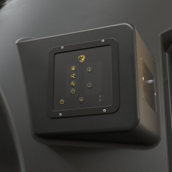 A black control panel for a Big Ass Fans Cool-Space 500 evaporative swamp cooler mounted on a wall.
