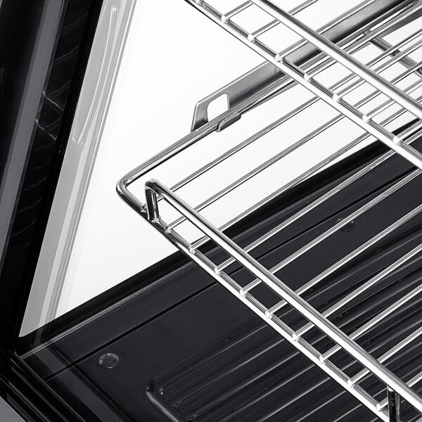 a metal rack with a black surface