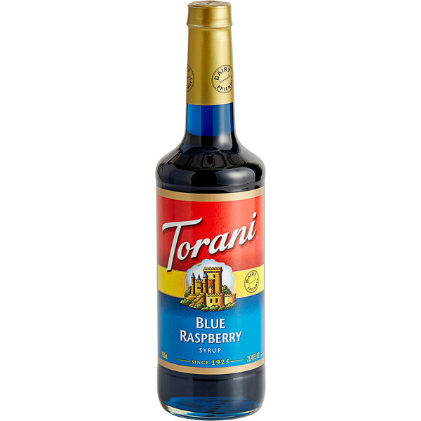 A Torani Blue Raspberry syrup bottle with a red label.