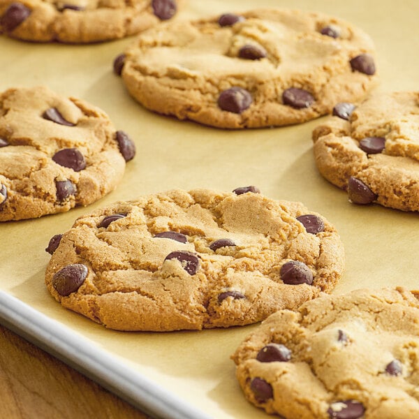 A close-up of a chocolate chip cookie with Enjoy Life Dark Vegan Chocolate Chips.