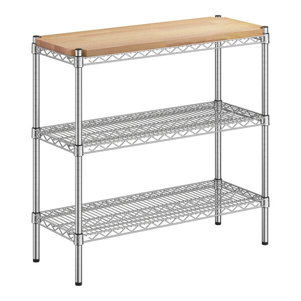 A Regency metal shelving kit with wooden shelves on a counter.