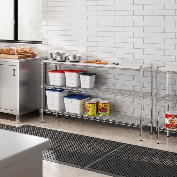 Regency chrome shelving in a kitchen with a white table.