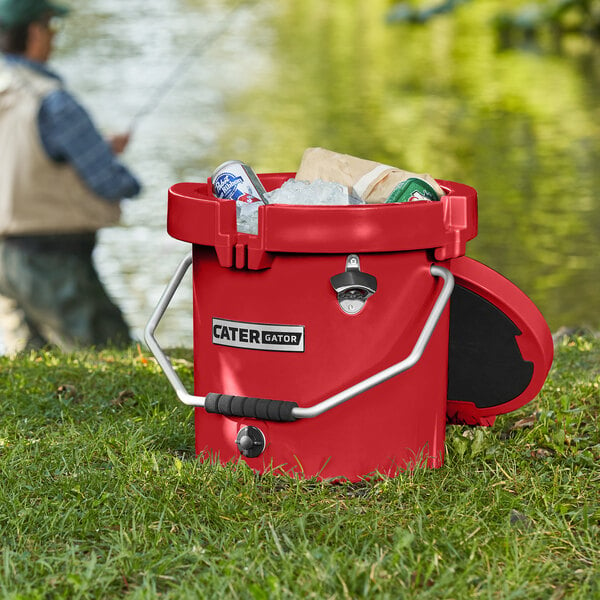 A red CaterGator outdoor cooler with a lid open.